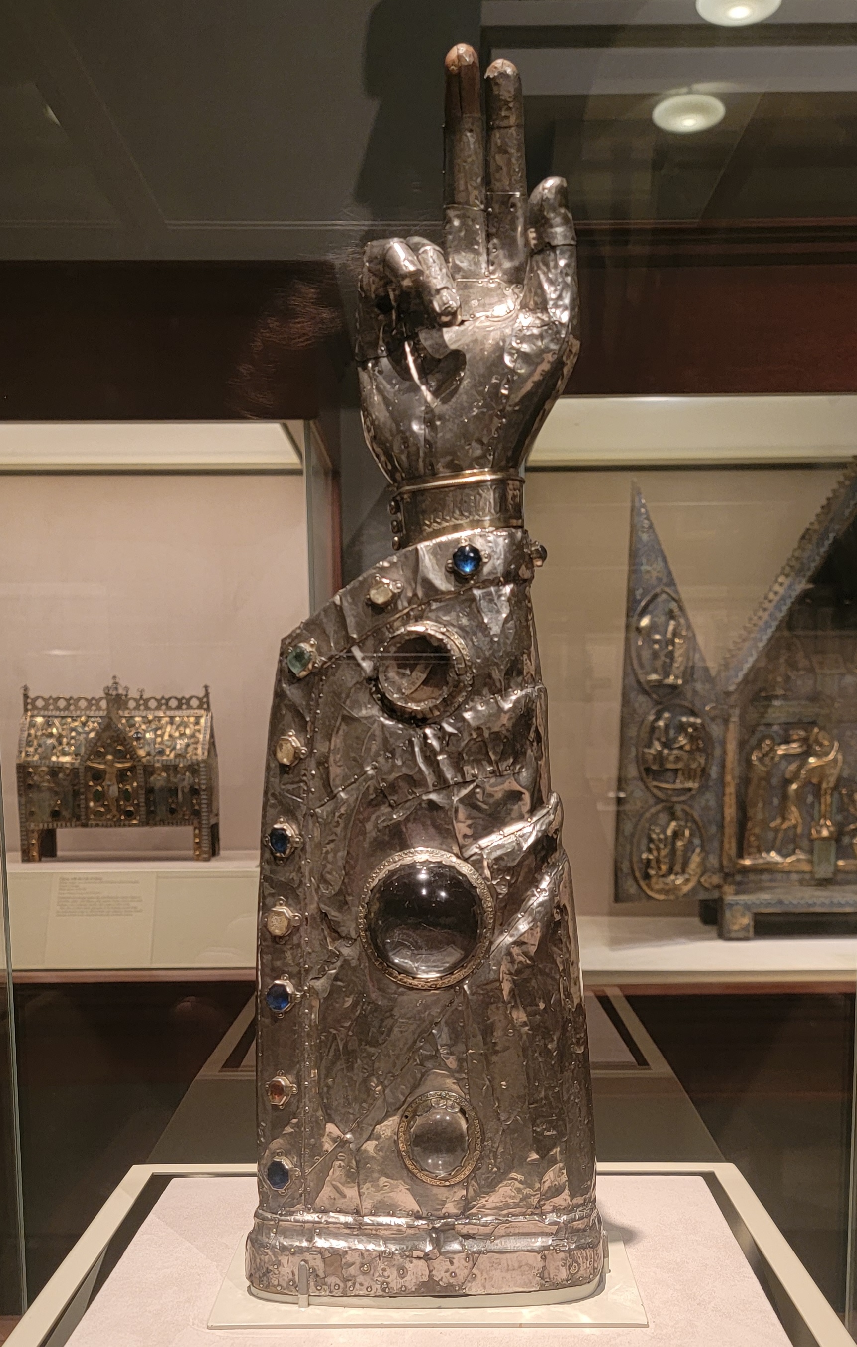 Silver reliquary in the shape of a hand pointing up